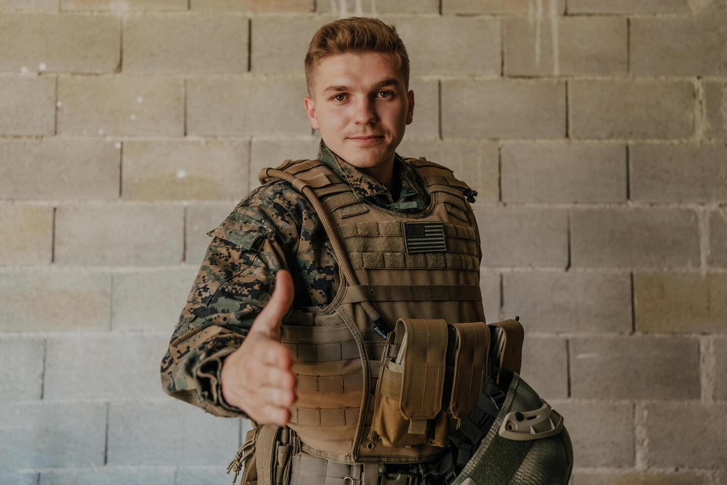 I choose you. A soldier with an outstretched hand towards the camera shows that he chooses you for support and partnership in warfare photo