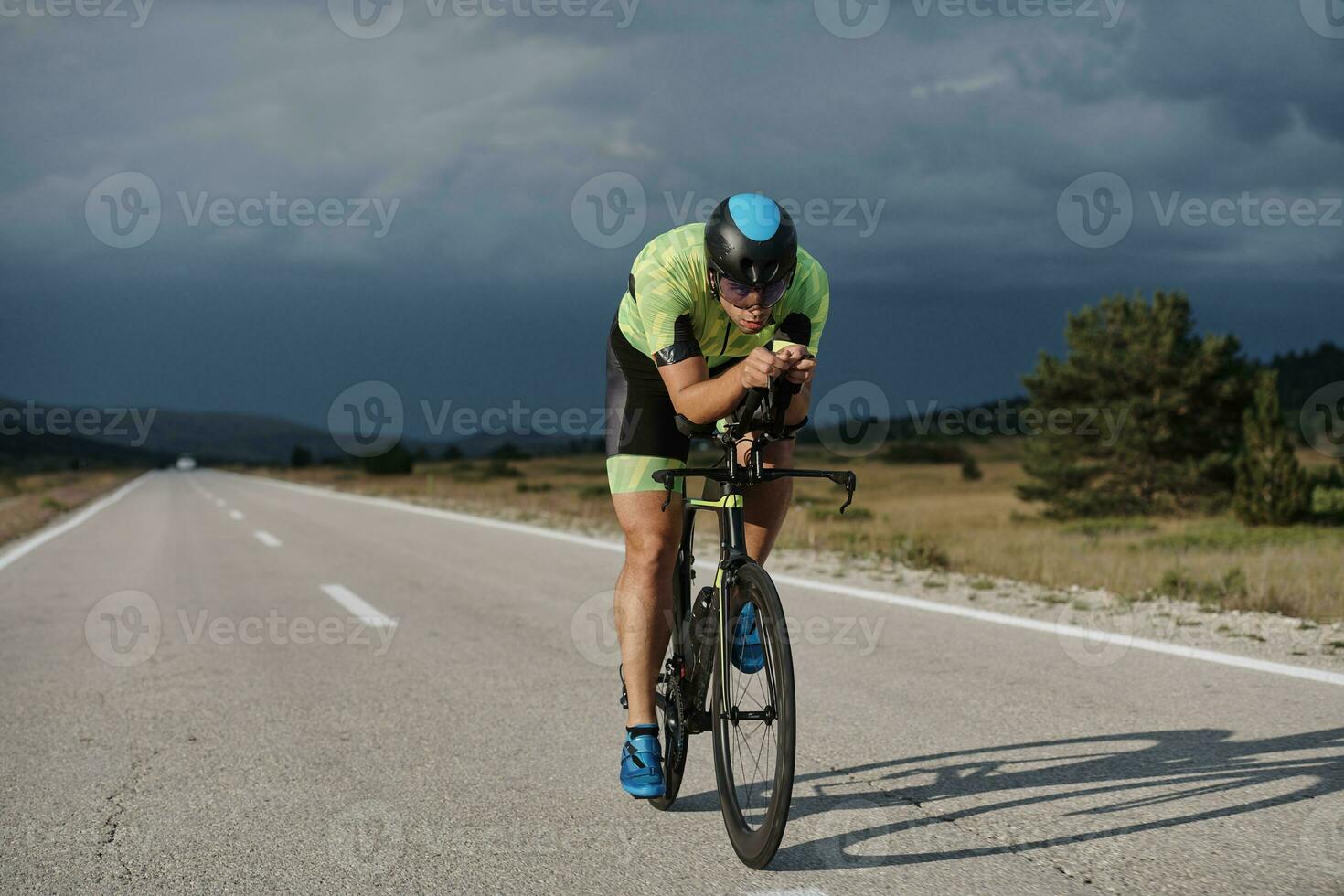 triathlon athlete riding bike photo