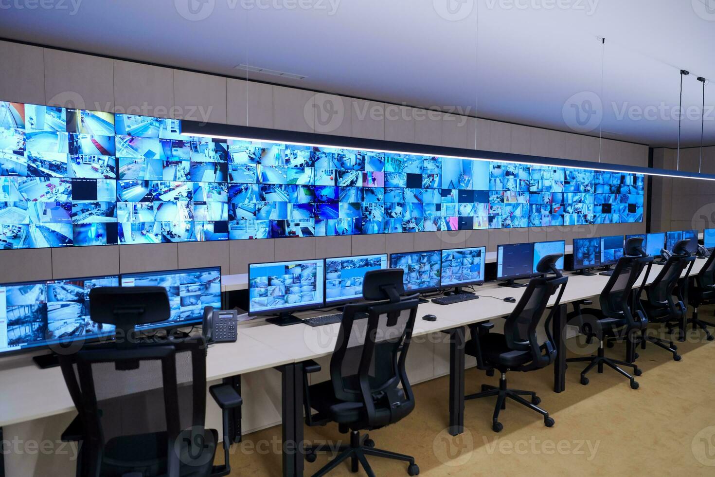 Empty interior of big modern security system control room photo