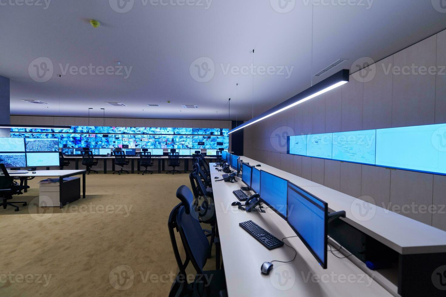 Empty interior of big modern security system control room photo