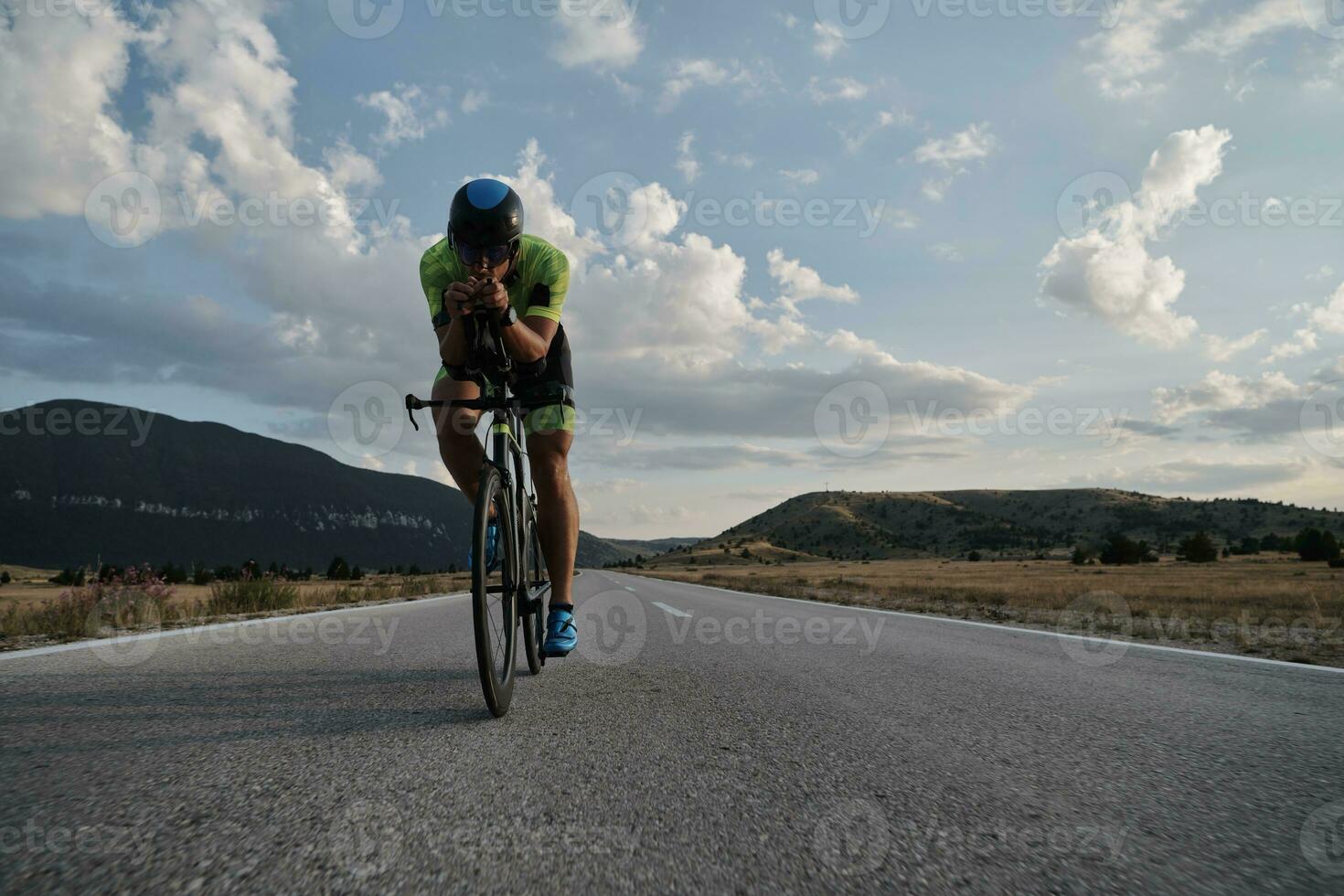 triathlon athlete riding bike photo