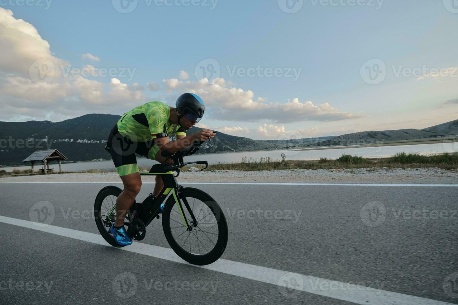 triathlon athlete riding bike photo