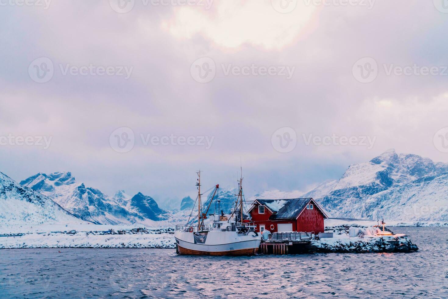 Traditional Norwegian fisherman's cabins and boats photo