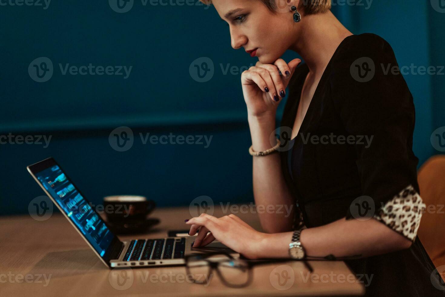 Businesswomen are stressed while working on laptop, Tired businesswoman with headache in coffee shop , feeling sick at work. Selective focus photo