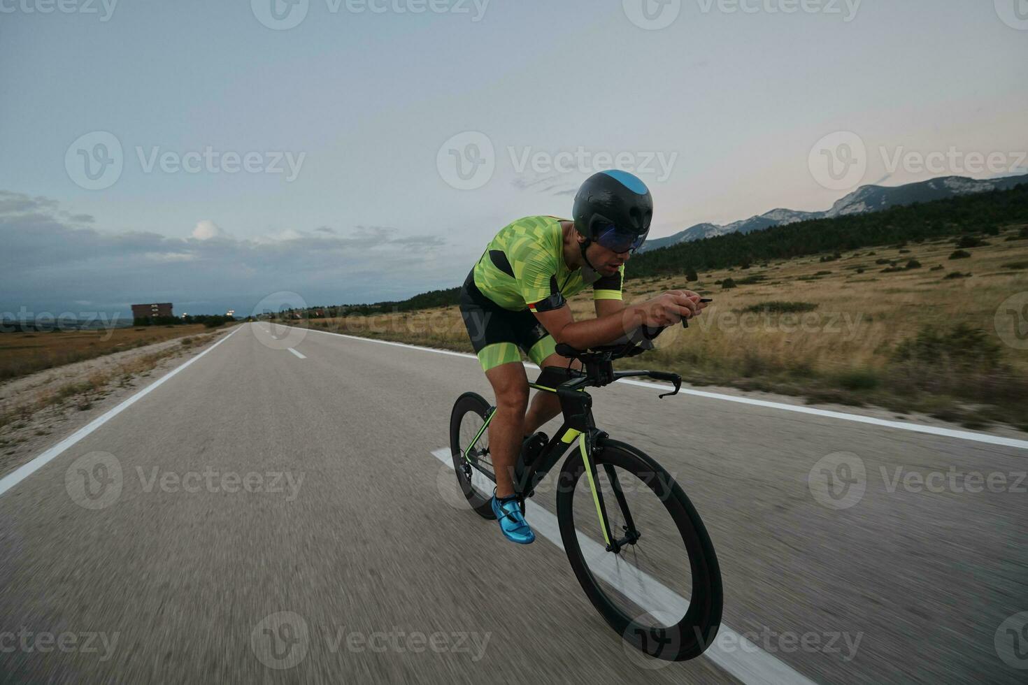 triathlon athlete riding bike photo