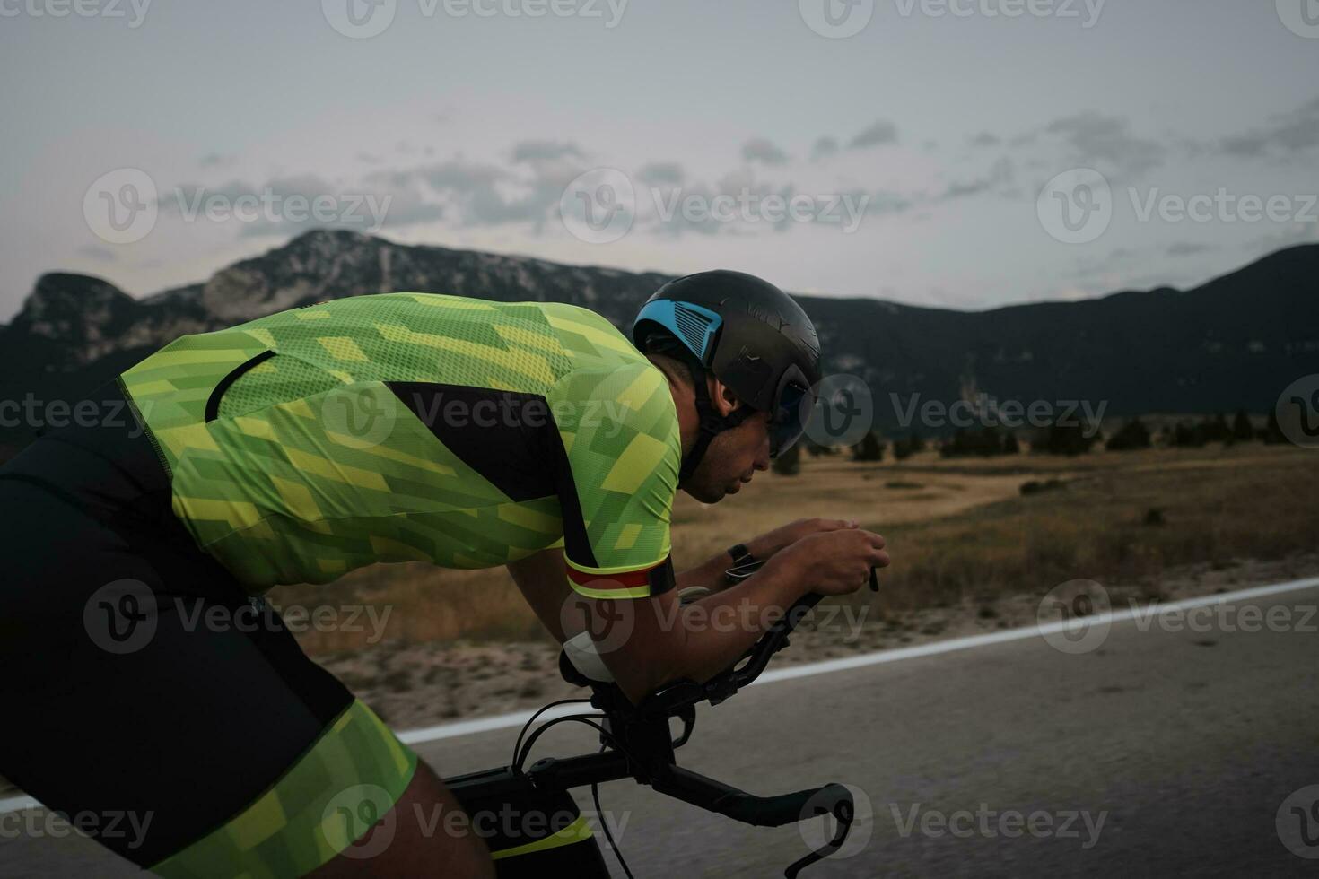 triathlon athlete riding bike photo