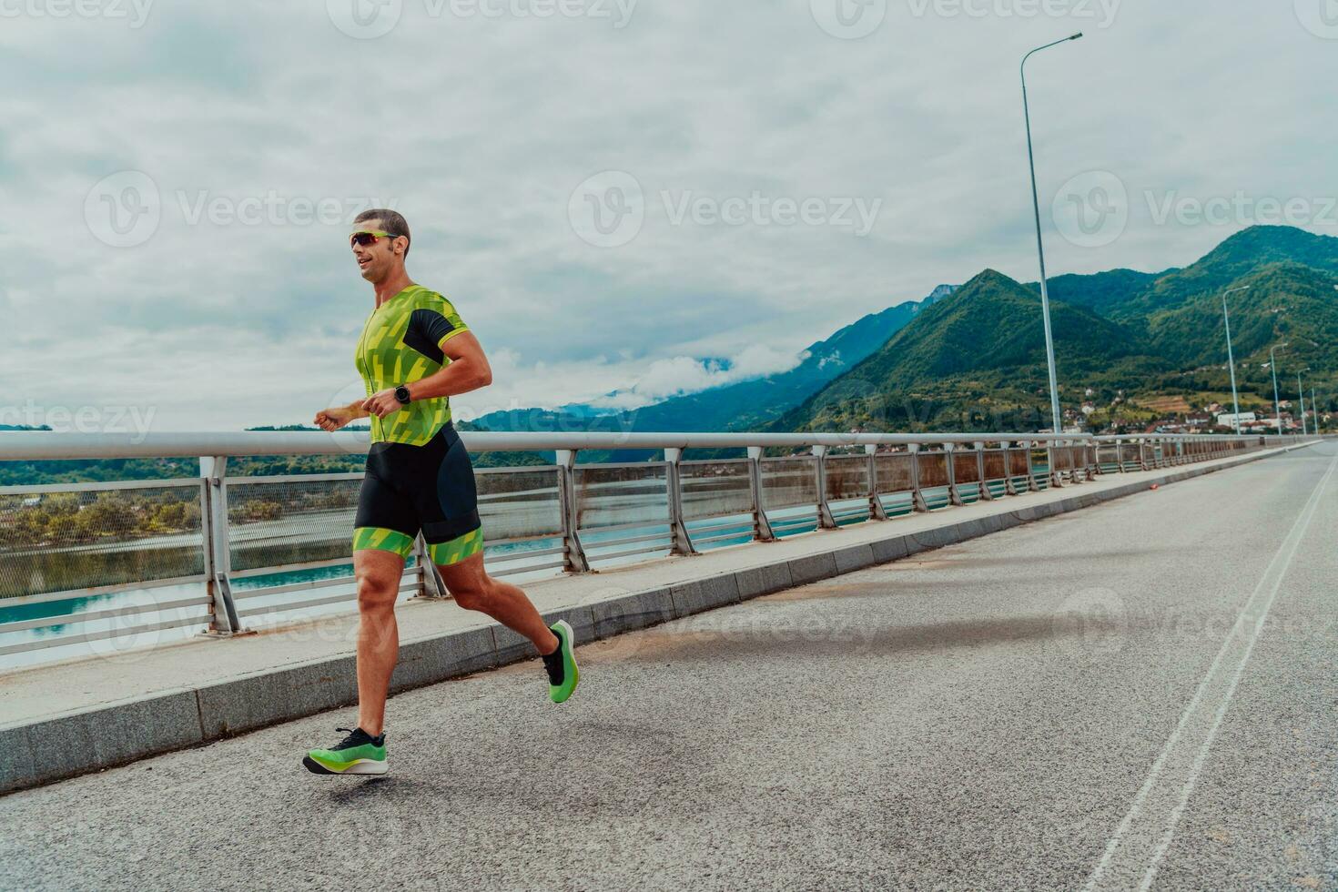 An athlete running a marathon and preparing for his competition. Photo of a marathon runner running in an urban environment