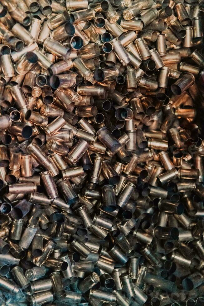 Empty spent ammunition casings in the box photo