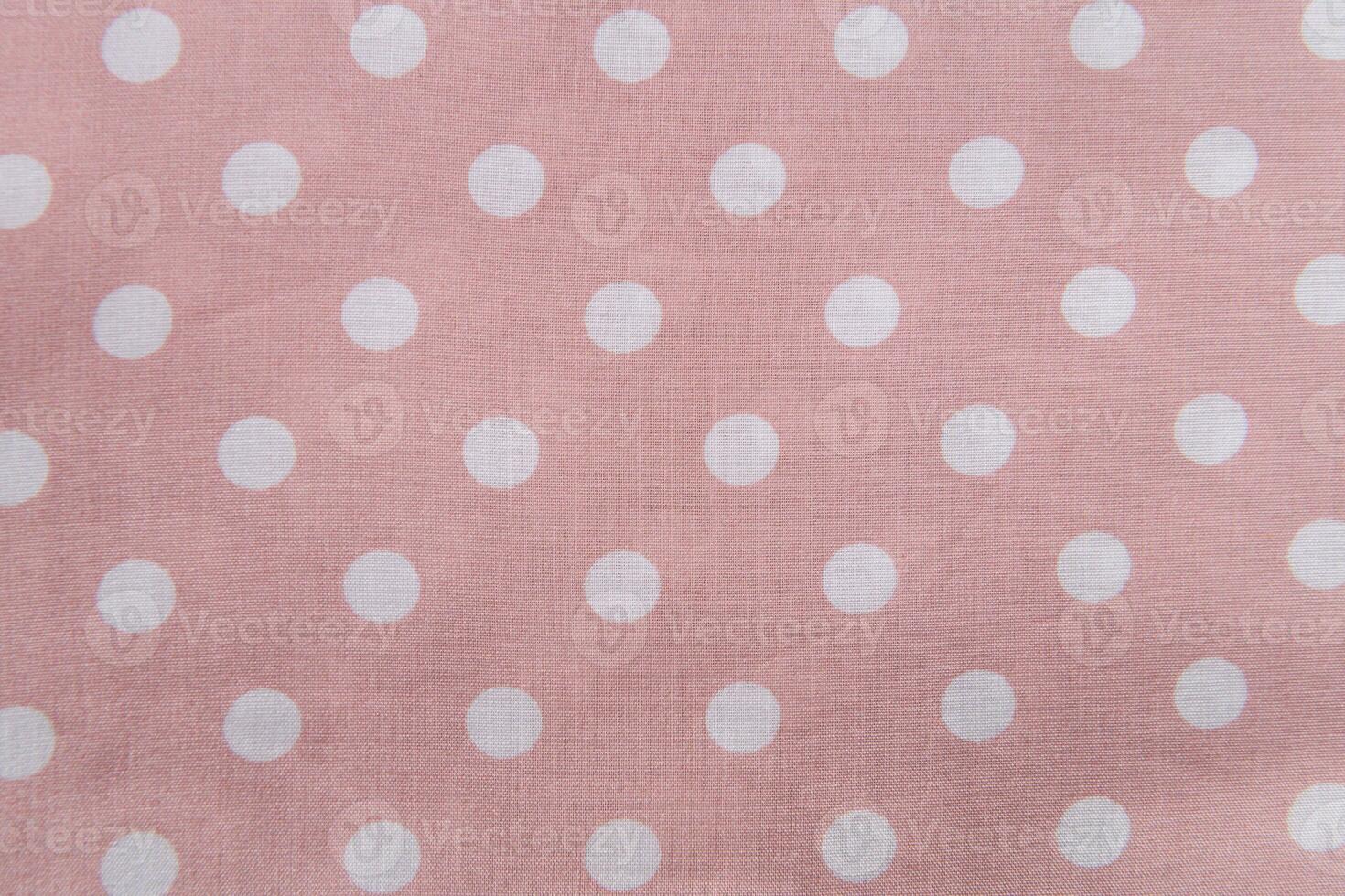 Collection of fashionable fabrics. Samples of different natural fabrics for sewing a fashion collection of clothes. Large selection of fabrics in the store or tailor warehouse. photo