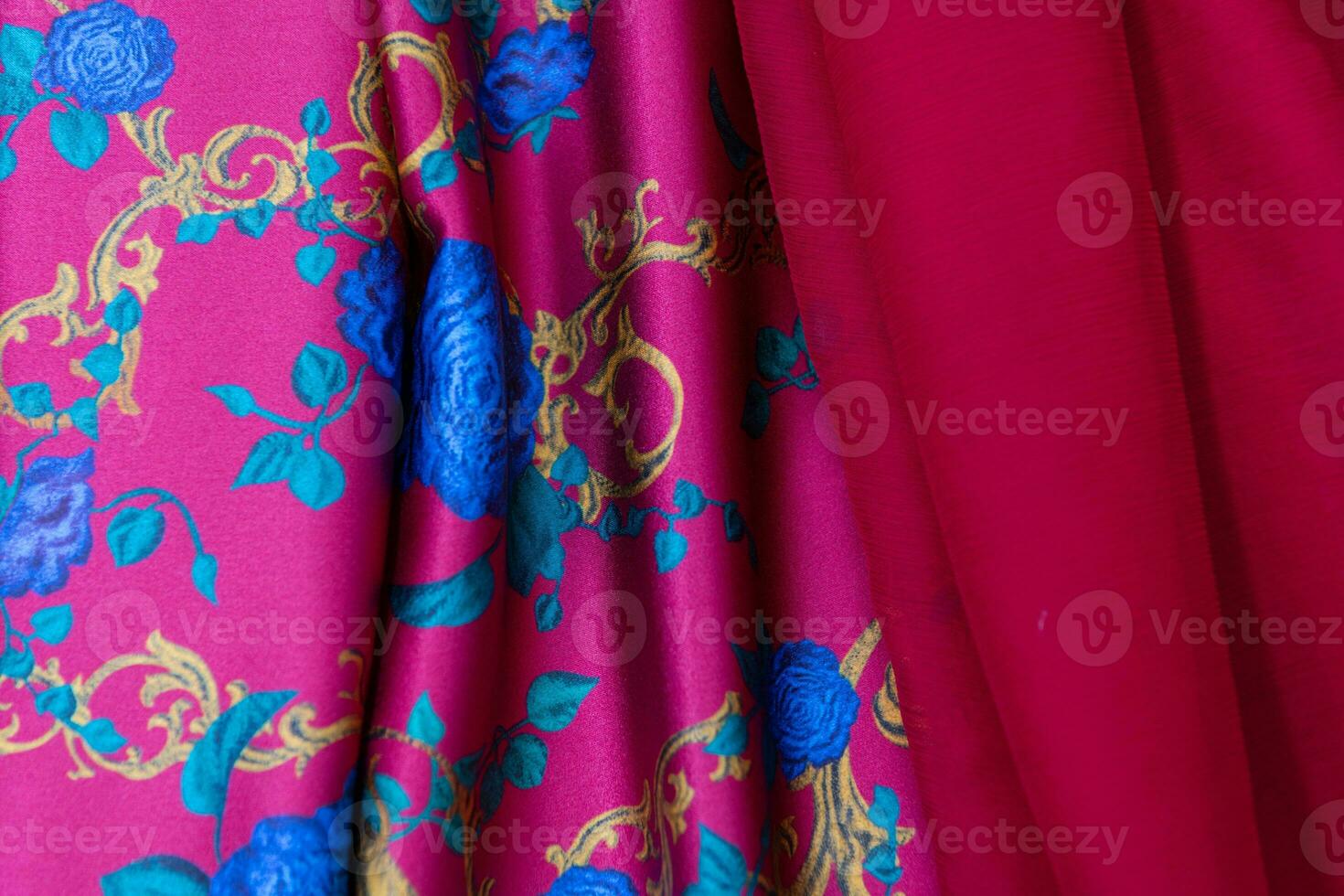 Collection of fashionable fabrics. Samples of different natural fabrics for sewing a fashion collection of clothes. Large selection of fabrics in the store or tailor warehouse. photo