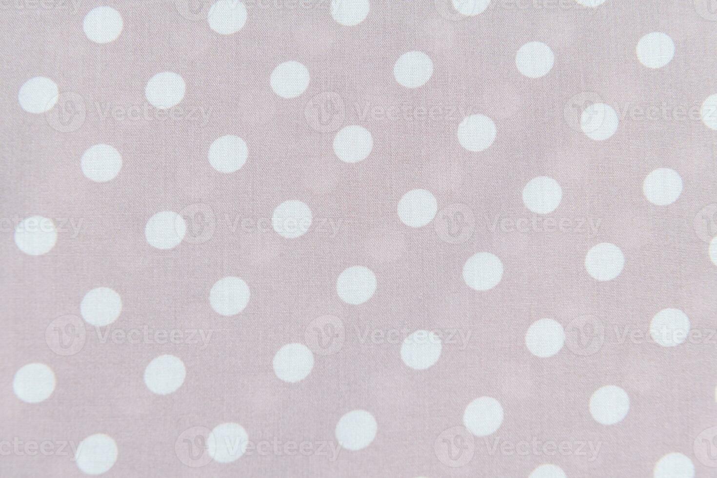 Collection of fashionable fabrics. Samples of different natural fabrics for sewing a fashion collection of clothes. Large selection of fabrics in the store or tailor warehouse. photo