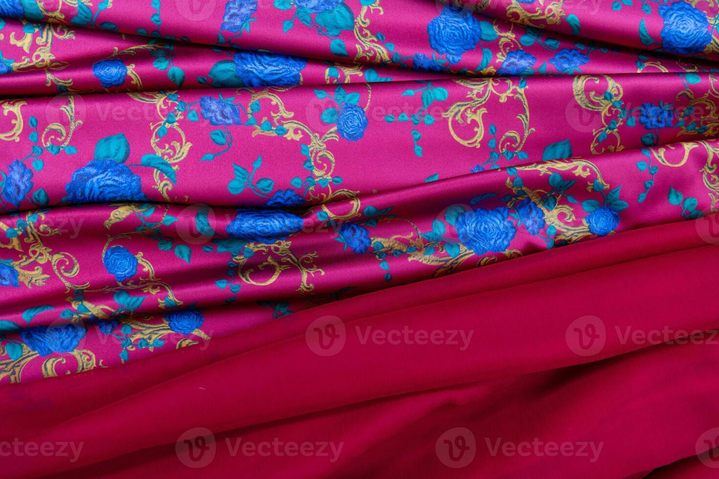 Collection of fashionable fabrics. Samples of different natural fabrics for sewing a fashion collection of clothes. Large selection of fabrics in the store or tailor warehouse. photo