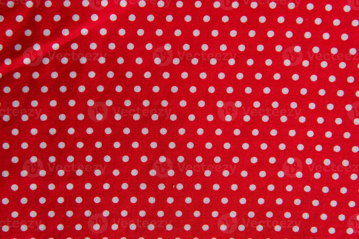 Collection of fashionable fabrics. Samples of different natural fabrics for sewing a fashion collection of clothes. Large selection of fabrics in the store or tailor warehouse. photo