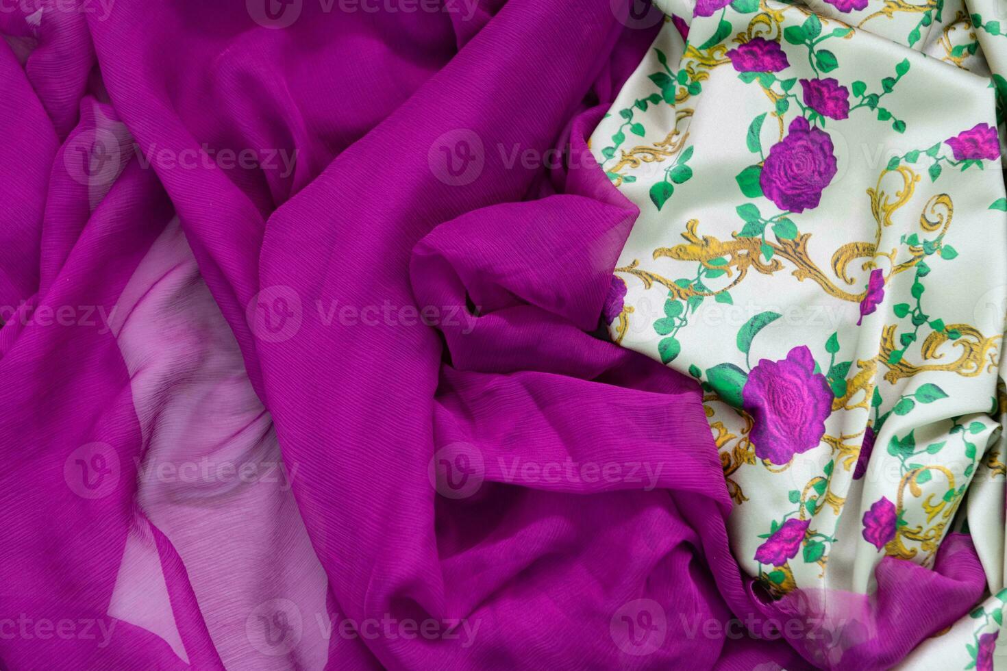 Collection of fashionable fabrics. Samples of different natural fabrics for sewing a fashion collection of clothes. Large selection of fabrics in the store or tailor warehouse. photo