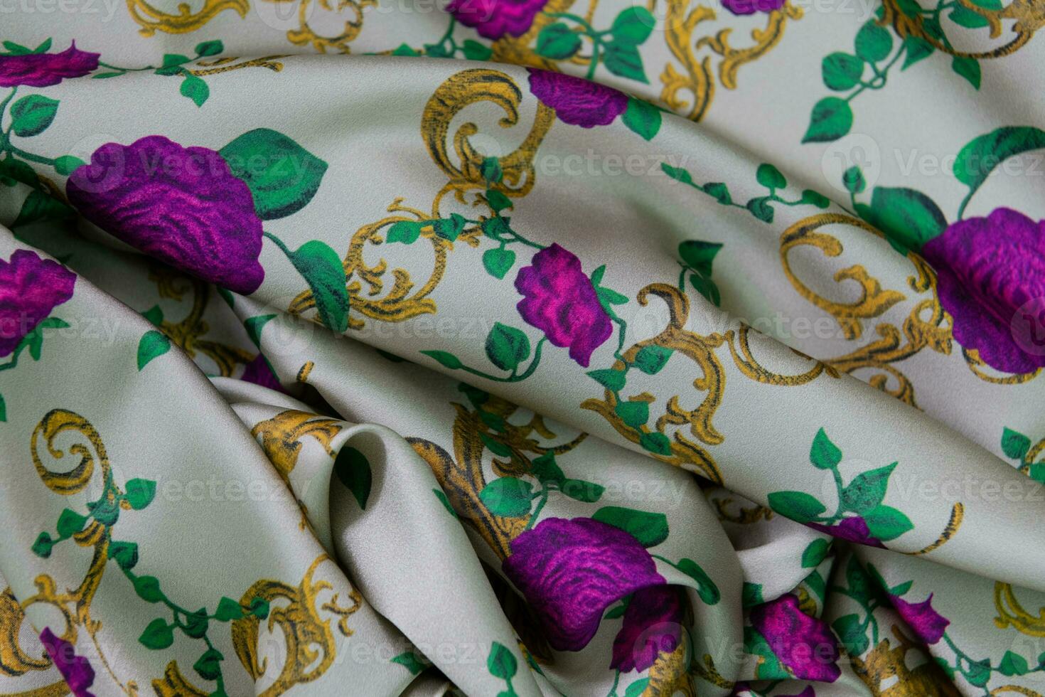 Collection of fashionable fabrics. Samples of different natural fabrics for sewing a fashion collection of clothes. Large selection of fabrics in the store or tailor warehouse. photo