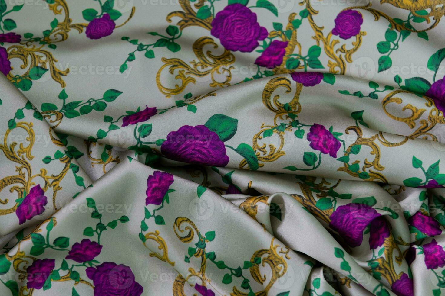 Collection of fashionable fabrics. Samples of different natural fabrics for sewing a fashion collection of clothes. Large selection of fabrics in the store or tailor warehouse. photo