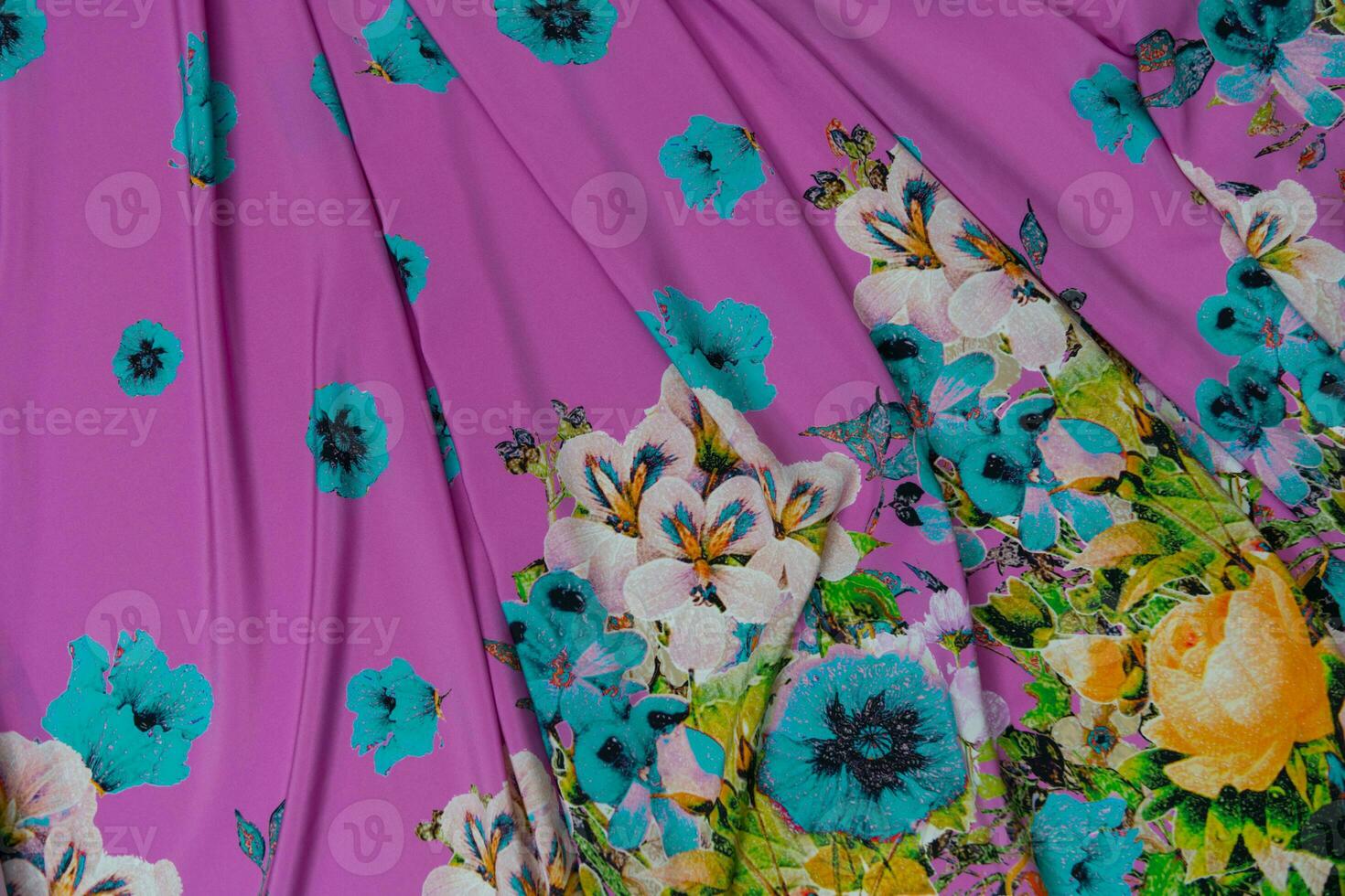 Collection of fashionable fabrics. Samples of different natural fabrics for sewing a fashion collection of clothes. Large selection of fabrics in the store or tailor warehouse. photo