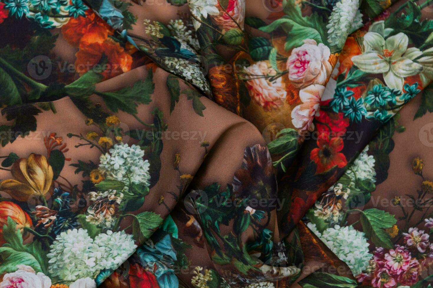 Collection of fashionable fabrics. Samples of different natural fabrics for sewing a fashion collection of clothes. Large selection of fabrics in the store or tailor warehouse. photo