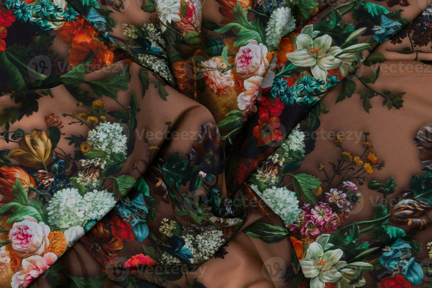 Collection of fashionable fabrics. Samples of different natural fabrics for sewing a fashion collection of clothes. Large selection of fabrics in the store or tailor warehouse. photo
