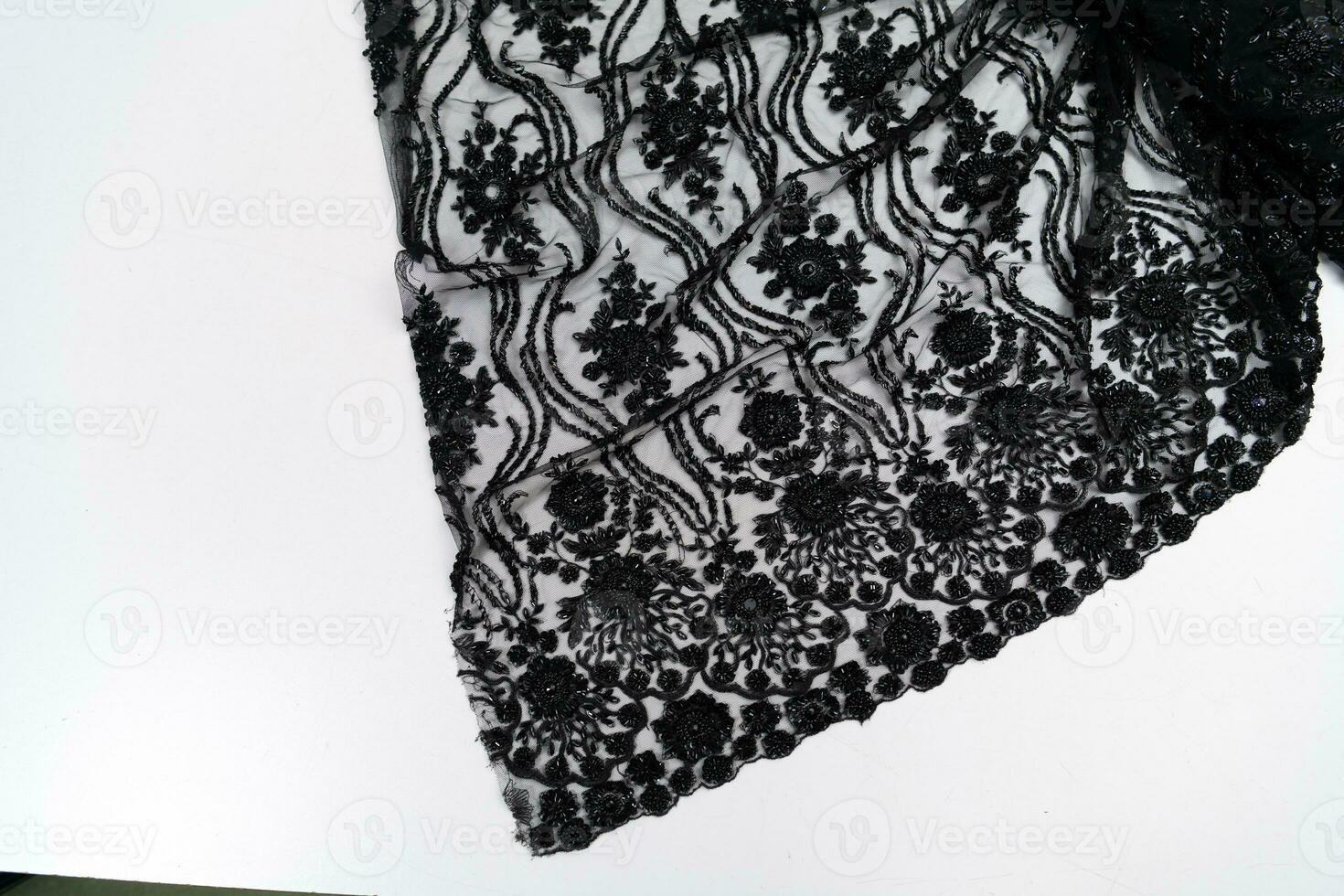 Collection of fashionable fabrics. Samples of different natural fabrics for sewing a fashion collection of clothes. Large selection of fabrics in the store or tailor warehouse. photo