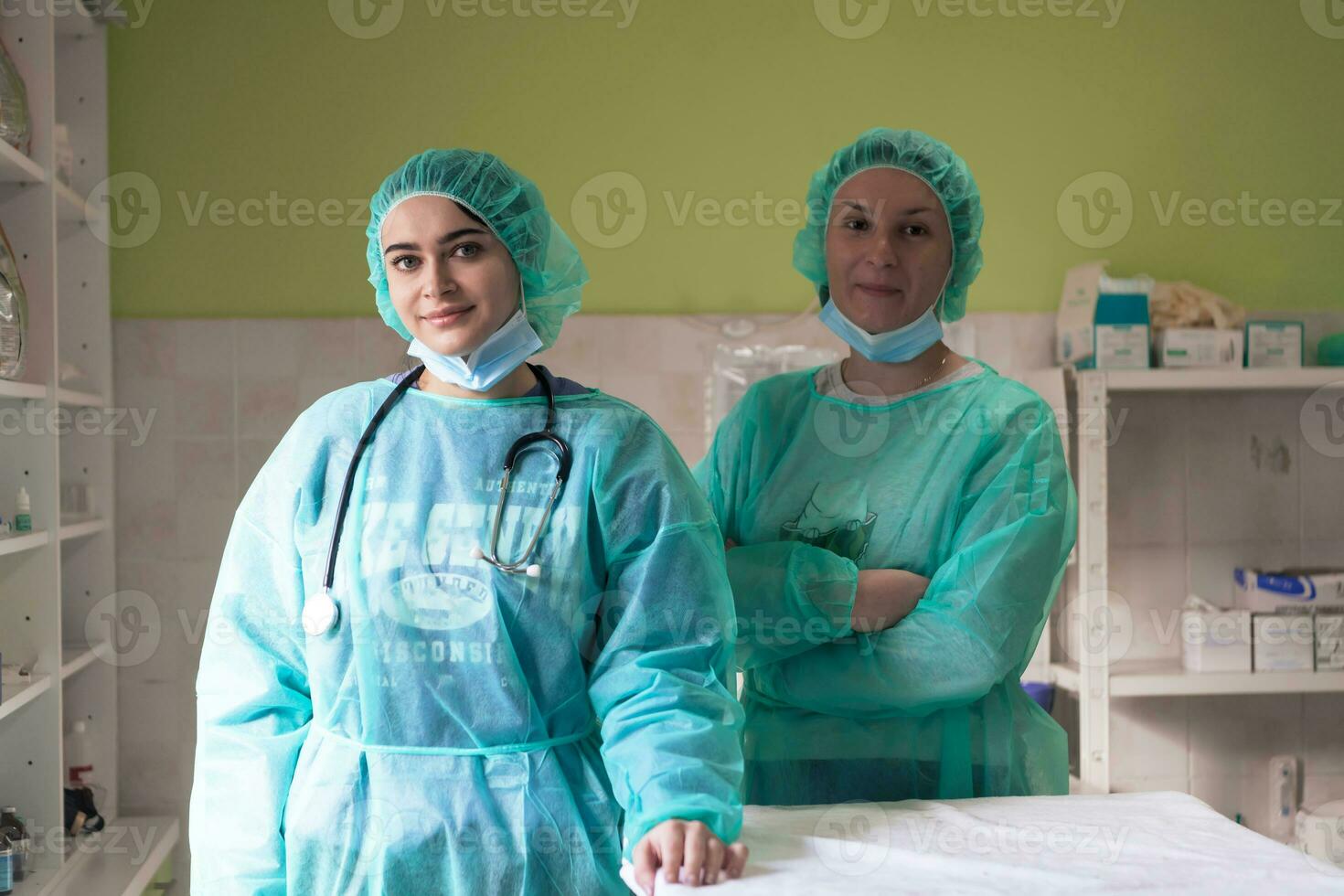 Portrait of doctors wearing uniform and preparing to doing surgical operation at the theater of hospital. Medical Concept. photo