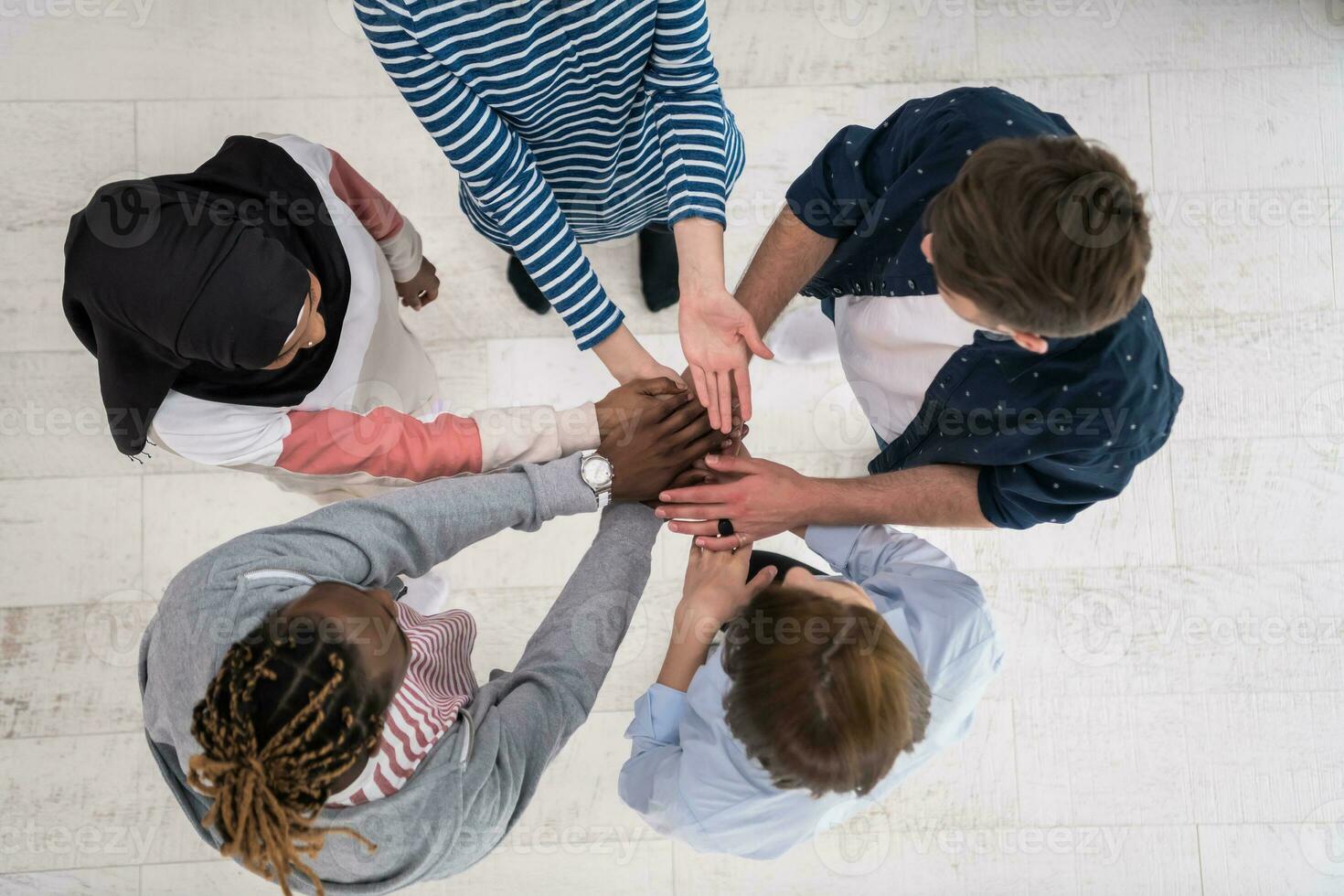 Top view of a diverse group of people symbolizing togetherness photo