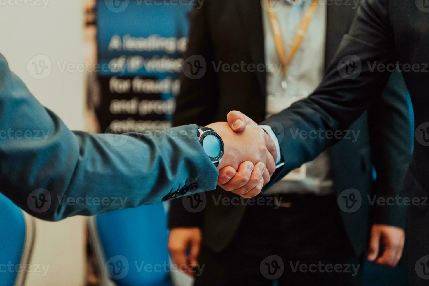 Close up a handshake, businessman together creates a mutually beneficial business relationship. The economic graph on the table photo