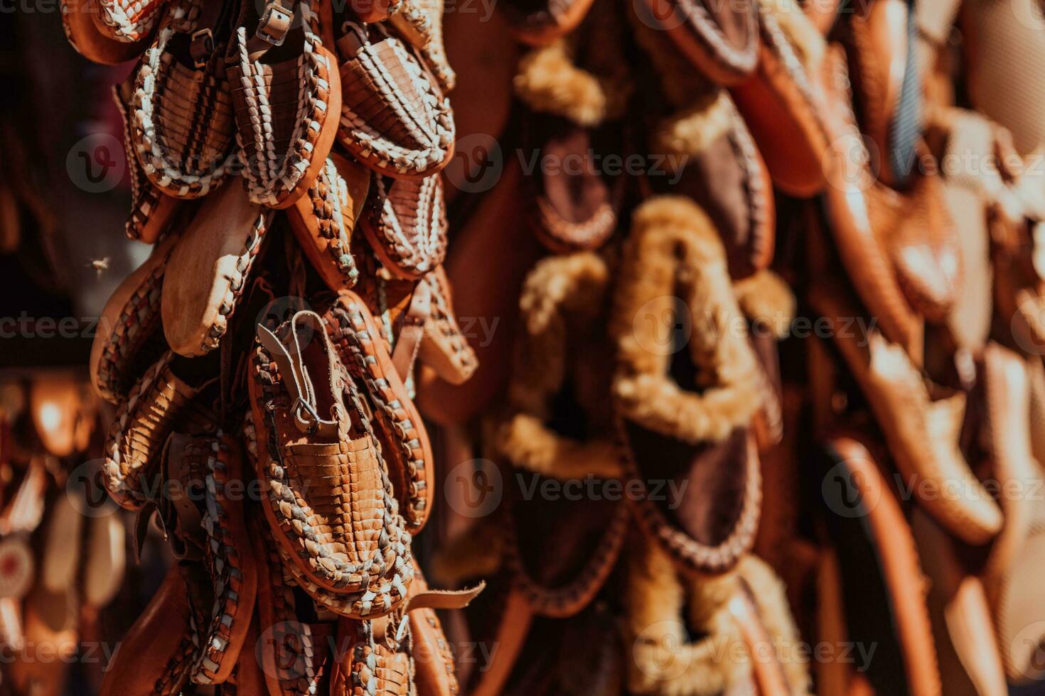 Macedonian folklore, brown sandals. Old shoes. Part of the tradition. Black pants, close up photo