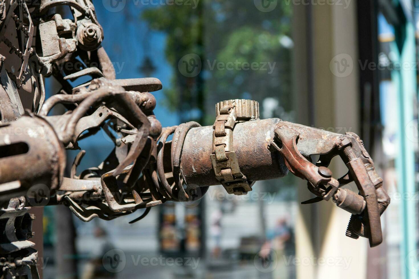 An old robot in the streets of a Macedonian city. The concept of the future and robotics photo