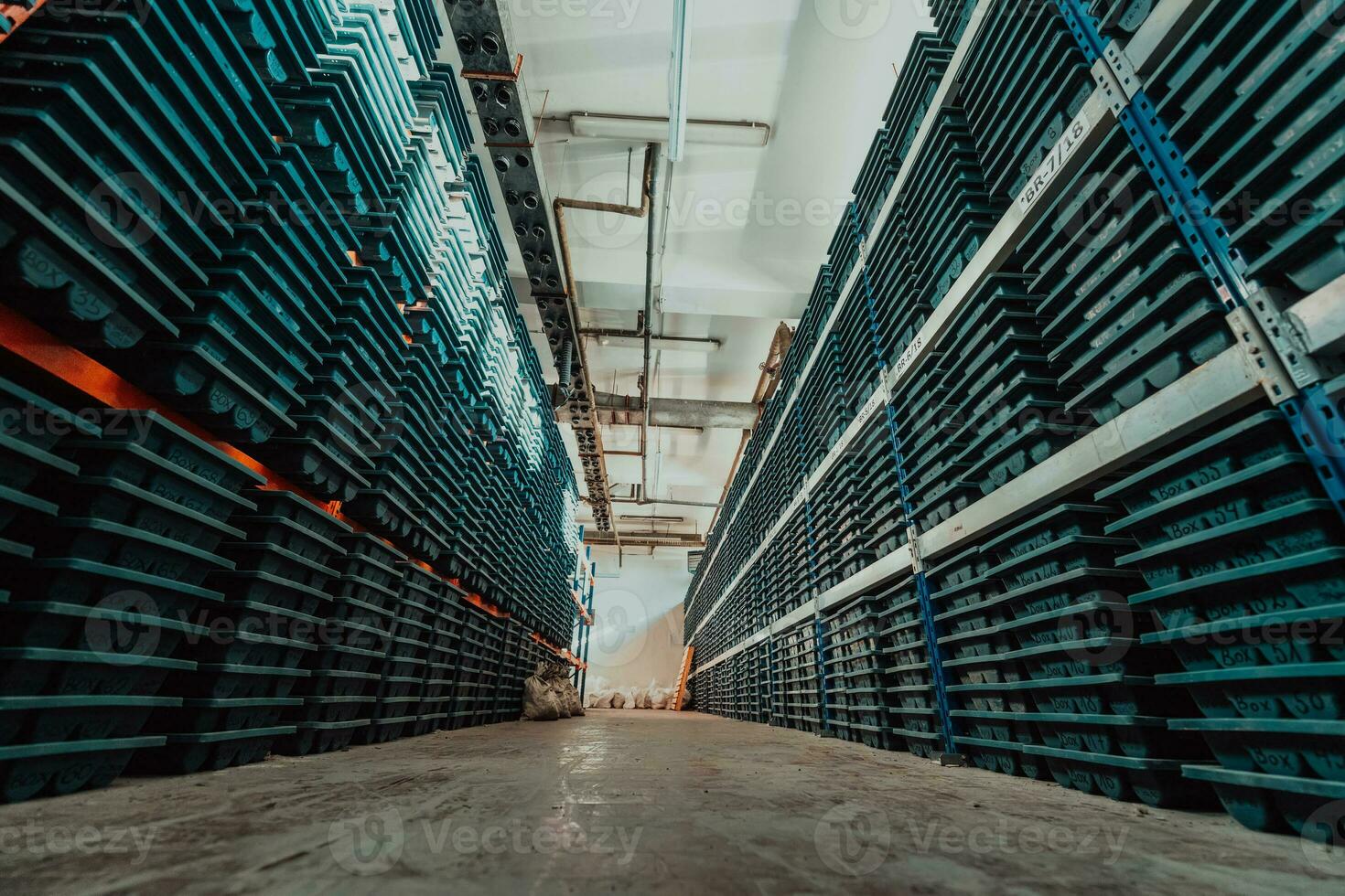 Gold mining storage rock core samples geology drilling industy. Large ore warehouse in modern industry, ores stacked in boxes. Selective focus photo