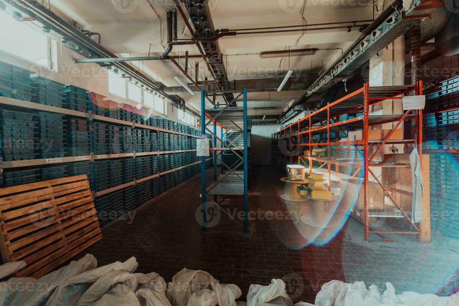 Gold mining storage rock core samples geology drilling industy. Large ore warehouse in modern industry, ores stacked in boxes. Selective focus photo