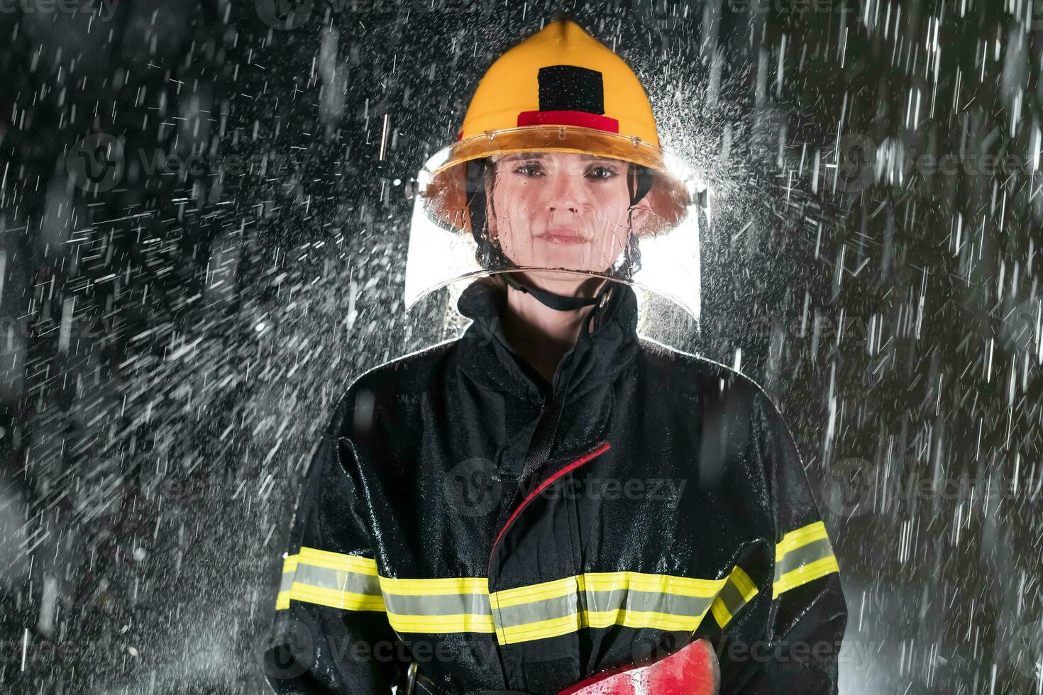 Portrait of a female firefighter standing and walking brave and optimistic. photo