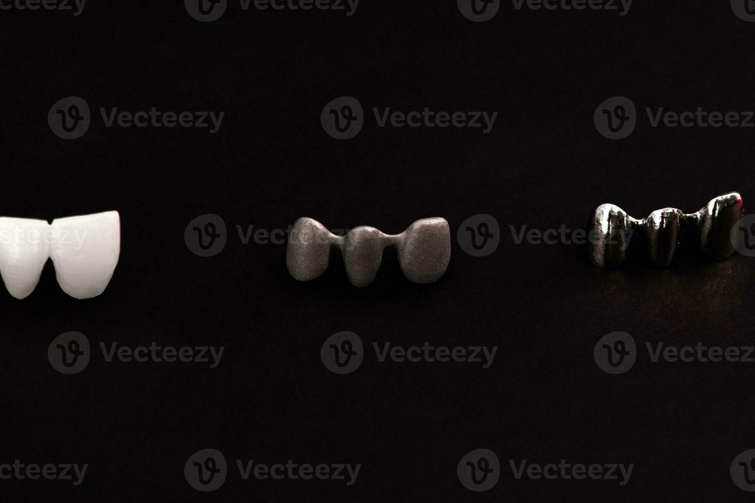 Teeth implant and crown installation process parts isolated on a black background. Medically accurate 3D model. photo