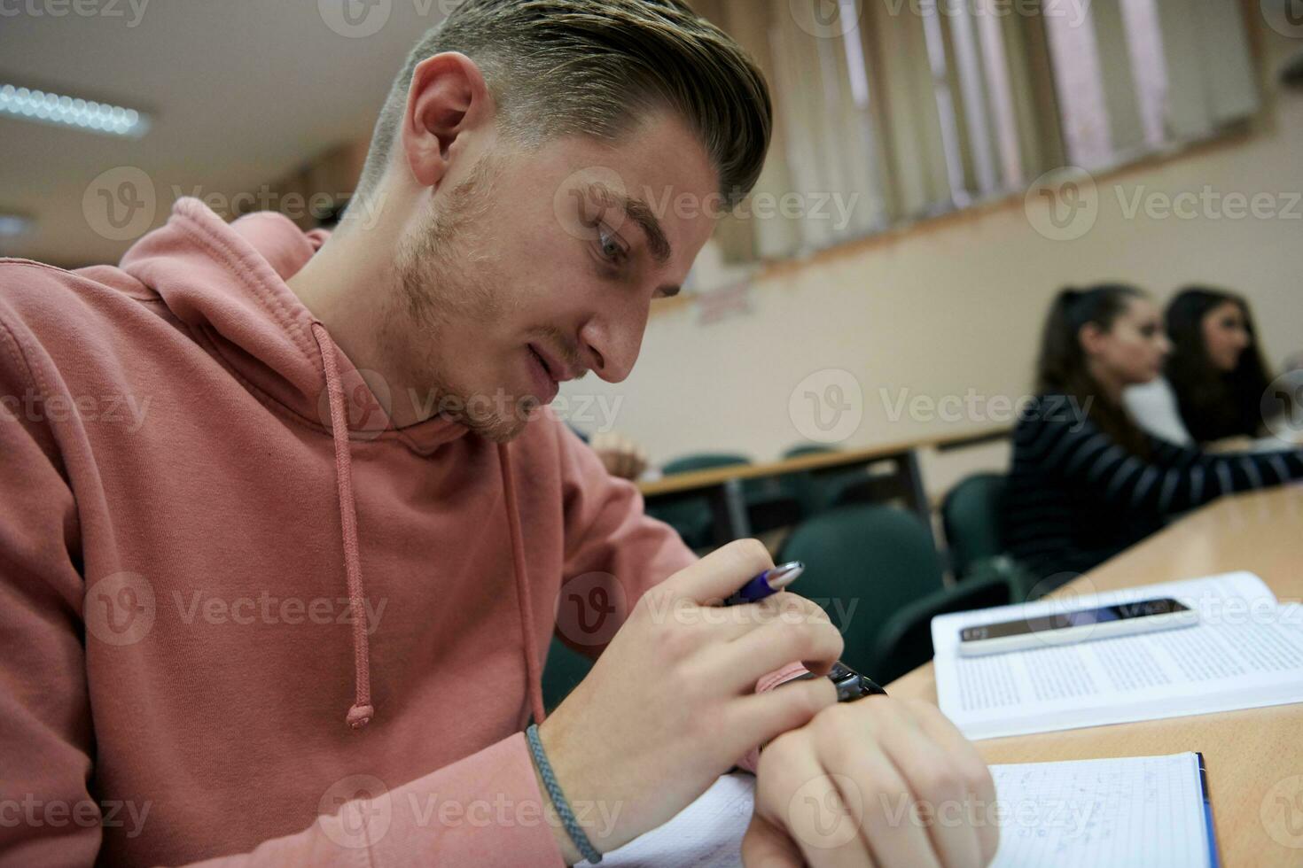 the student uses a smartwatch in math class photo