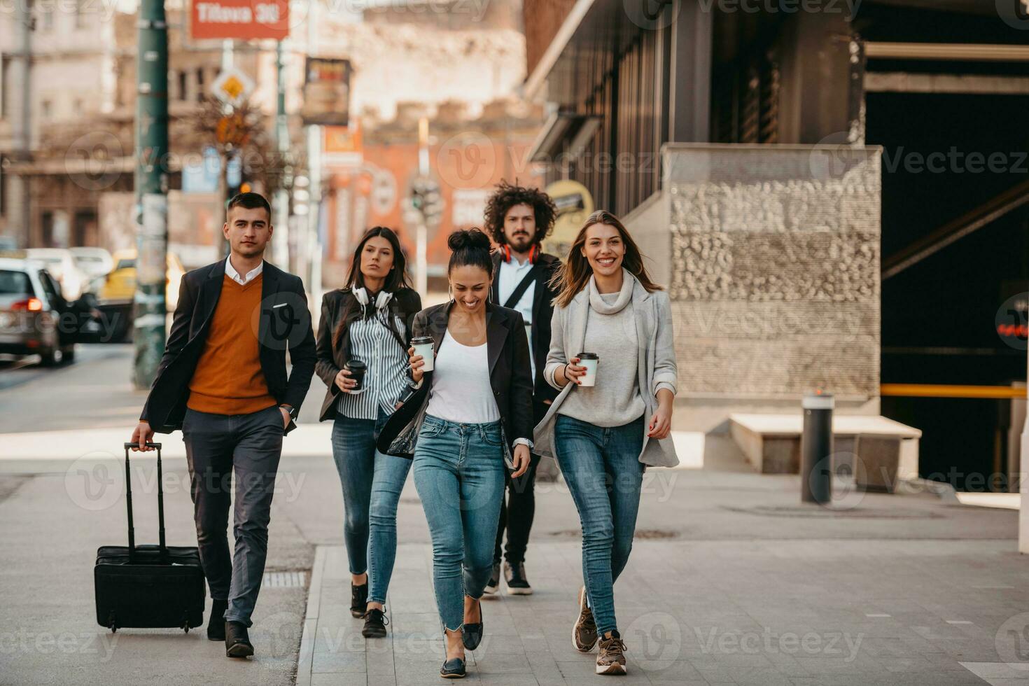 Elegant businesspeople walking in a modern city.. photo