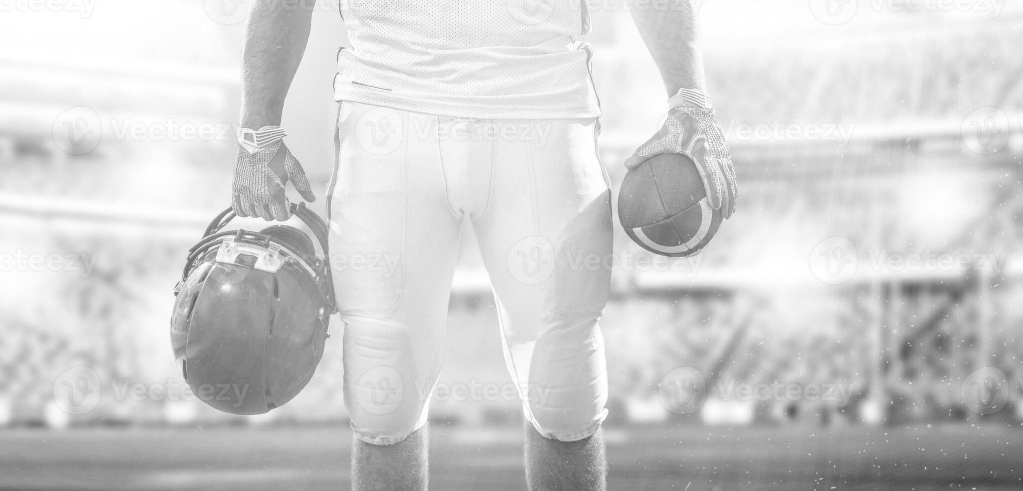 closeup American Football Player isolated on big modern stadium photo