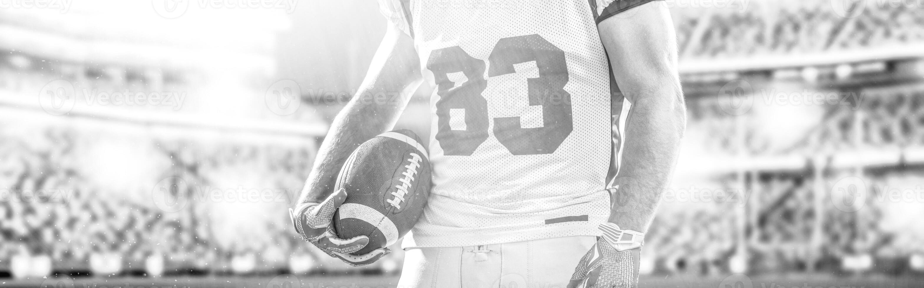 closeup American Football Player isolated on big modern stadium photo