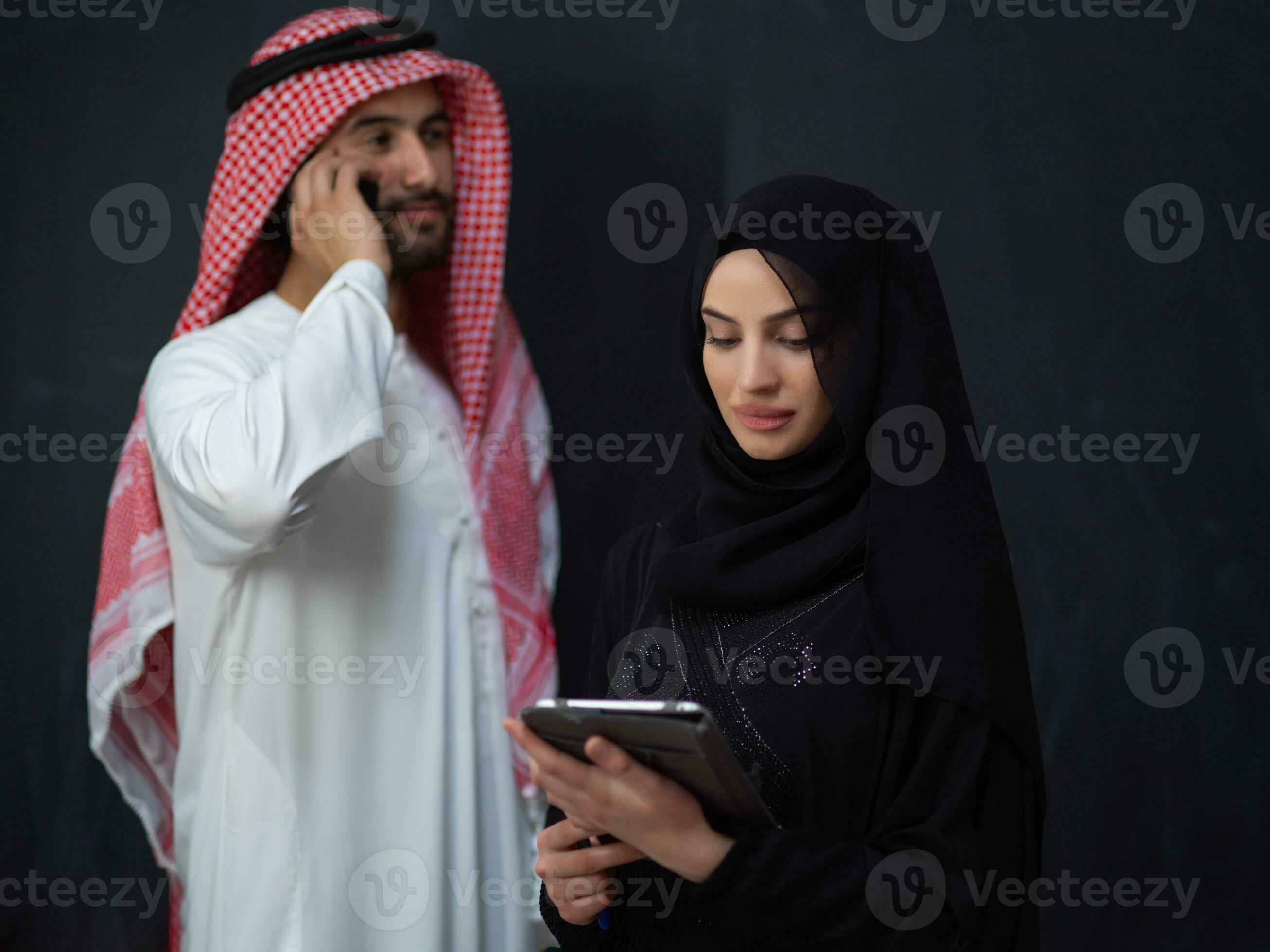 Young muslim business couple arabian man with woman in fashionable