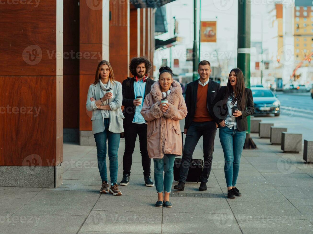 Elegant businesspeople walking in a modern city.. photo