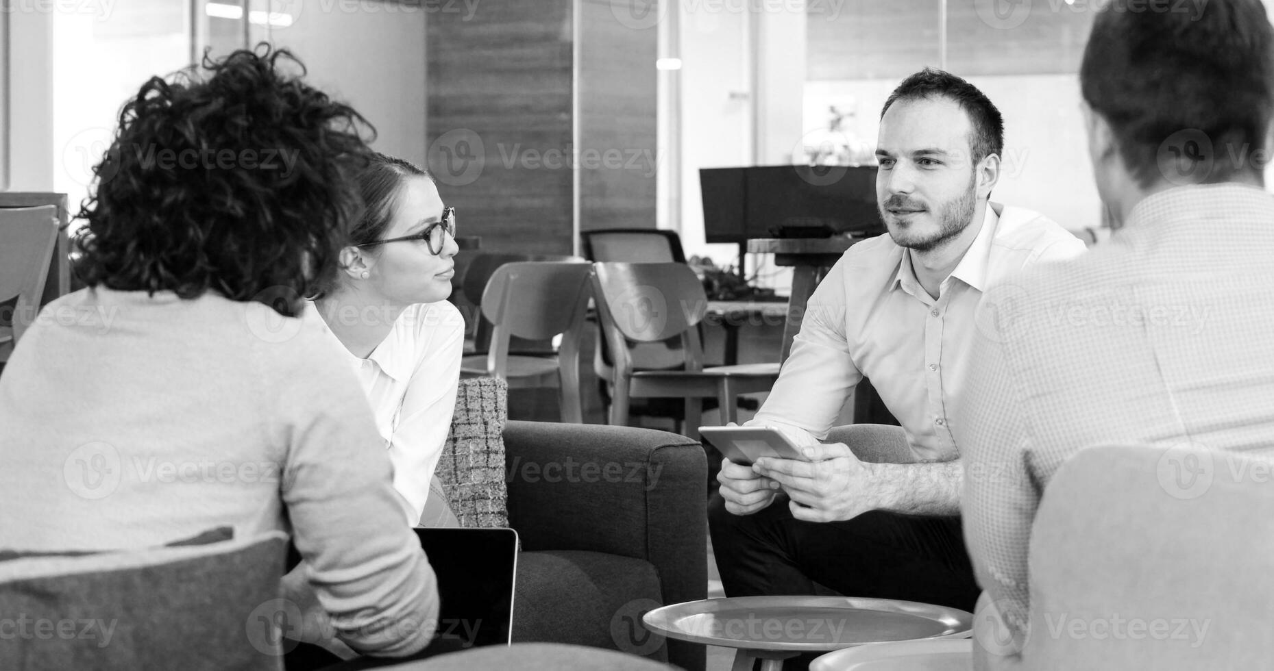 Startup Business Team At A Meeting at modern office building photo