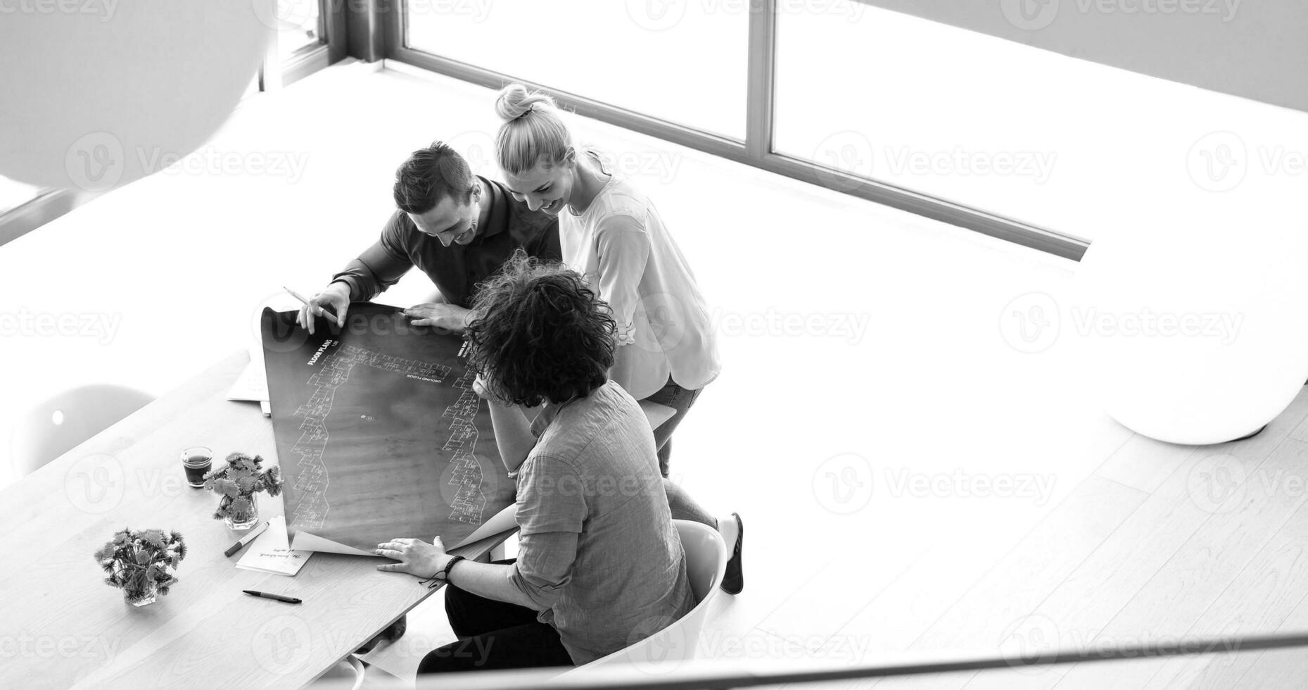 Startup Business Team At A Meeting at modern office building photo