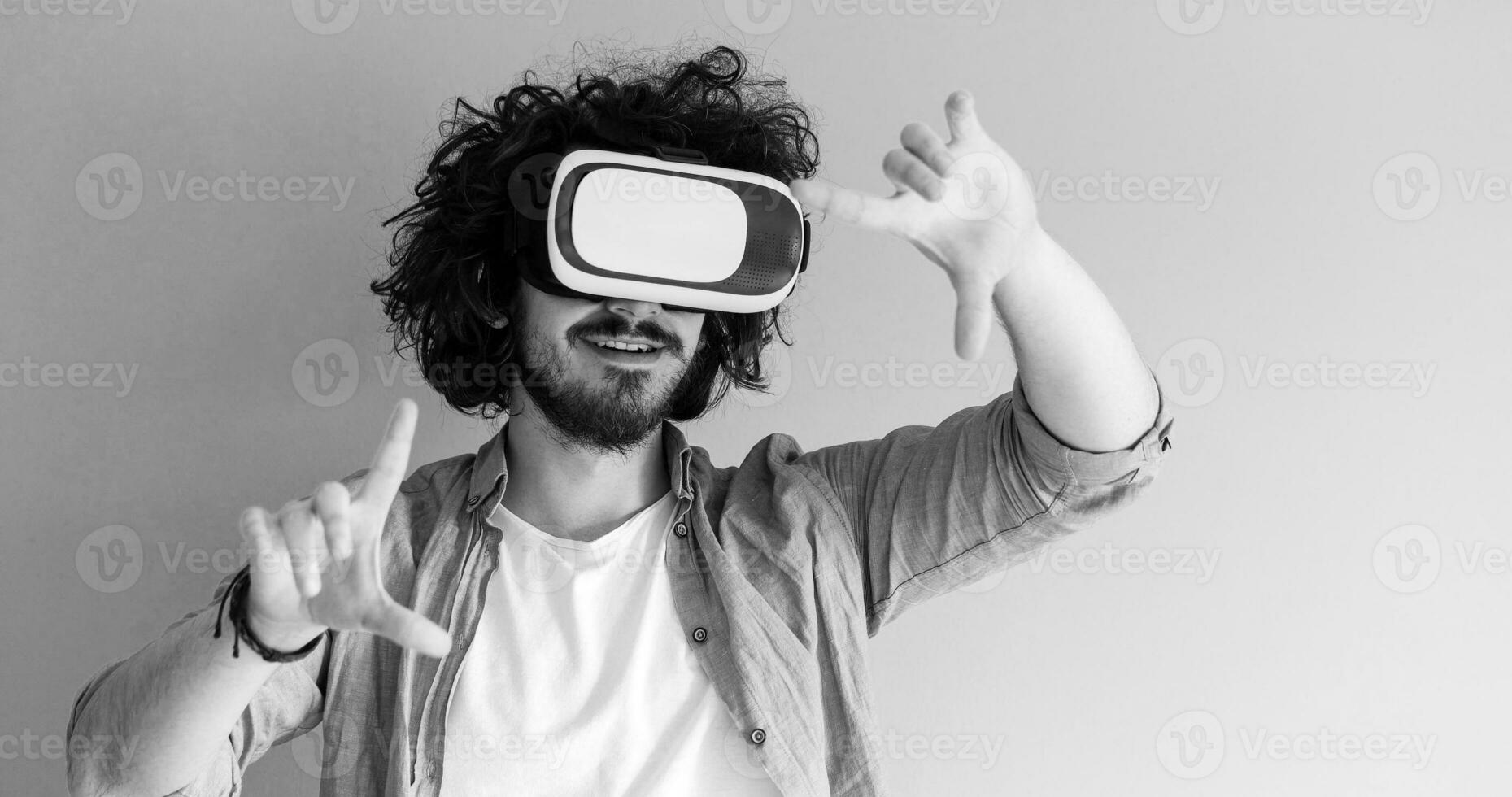 man using VR headset glasses of virtual reality photo