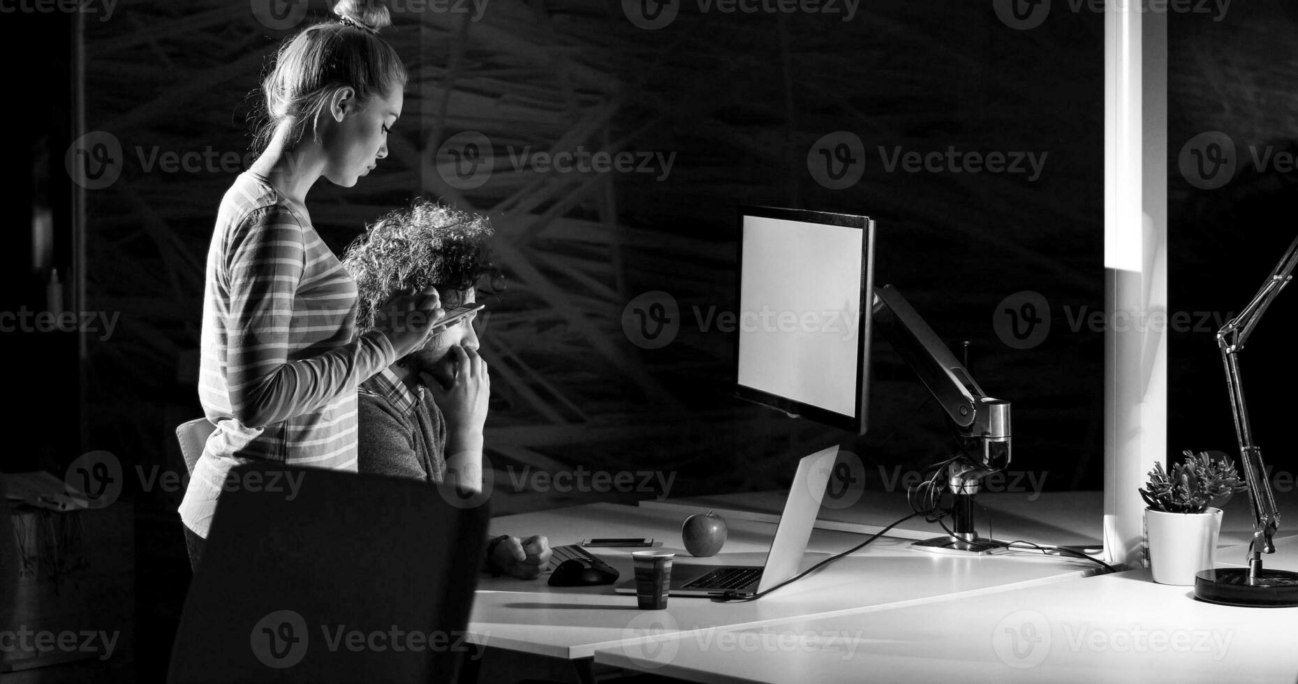 young designers in the night office photo