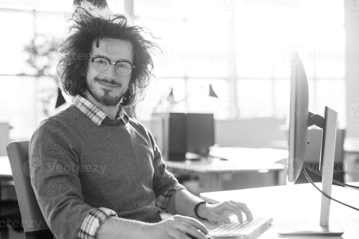 businessman working using a computer in startup office photo