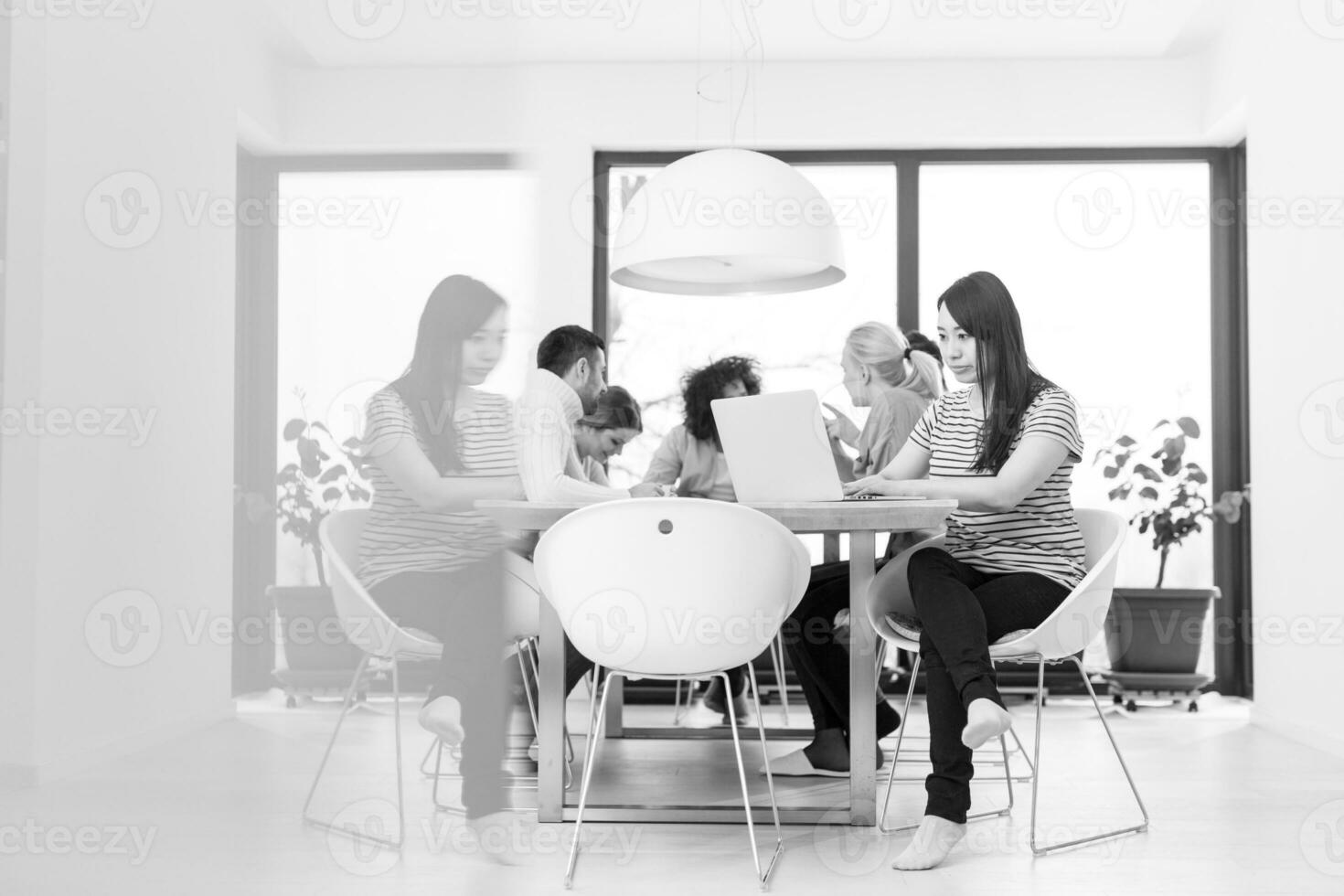 Startup Business Team At A Meeting at modern office building photo