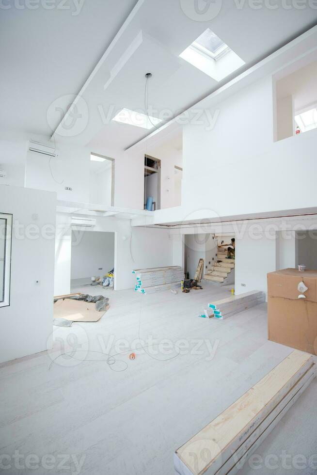 Interior of unfinished two level apartment photo