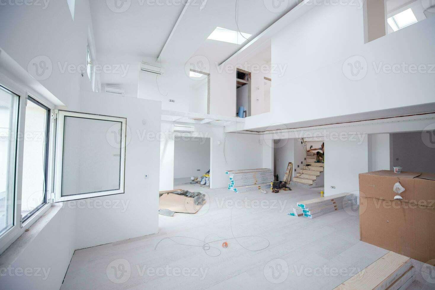 Interior of unfinished two level apartment photo