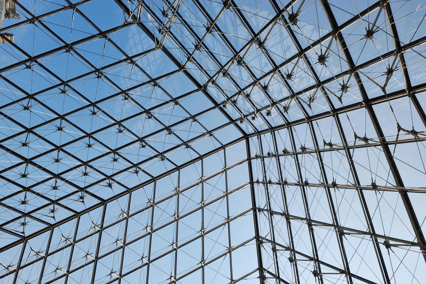 Metal roof top structure with glass construction photo