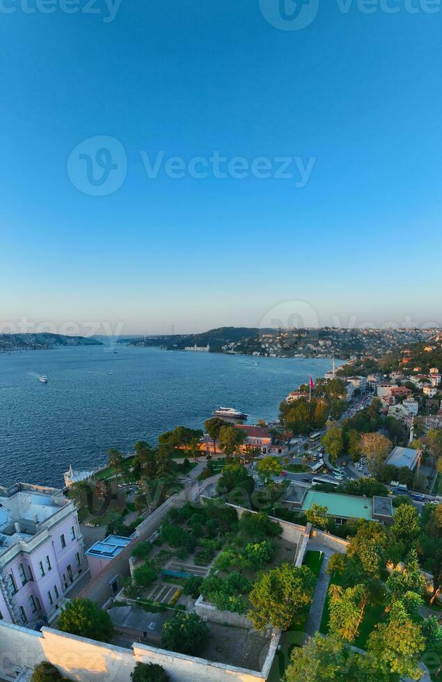 Istanbul, Turkey. Sultanahmet area with the Blue Mosque and the Hagia Sophia with a Golden Horn and Bosphorus bridge in the background at sunrise. photo