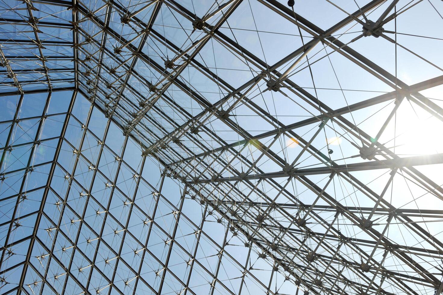 Metal roof top structure with glass construction photo